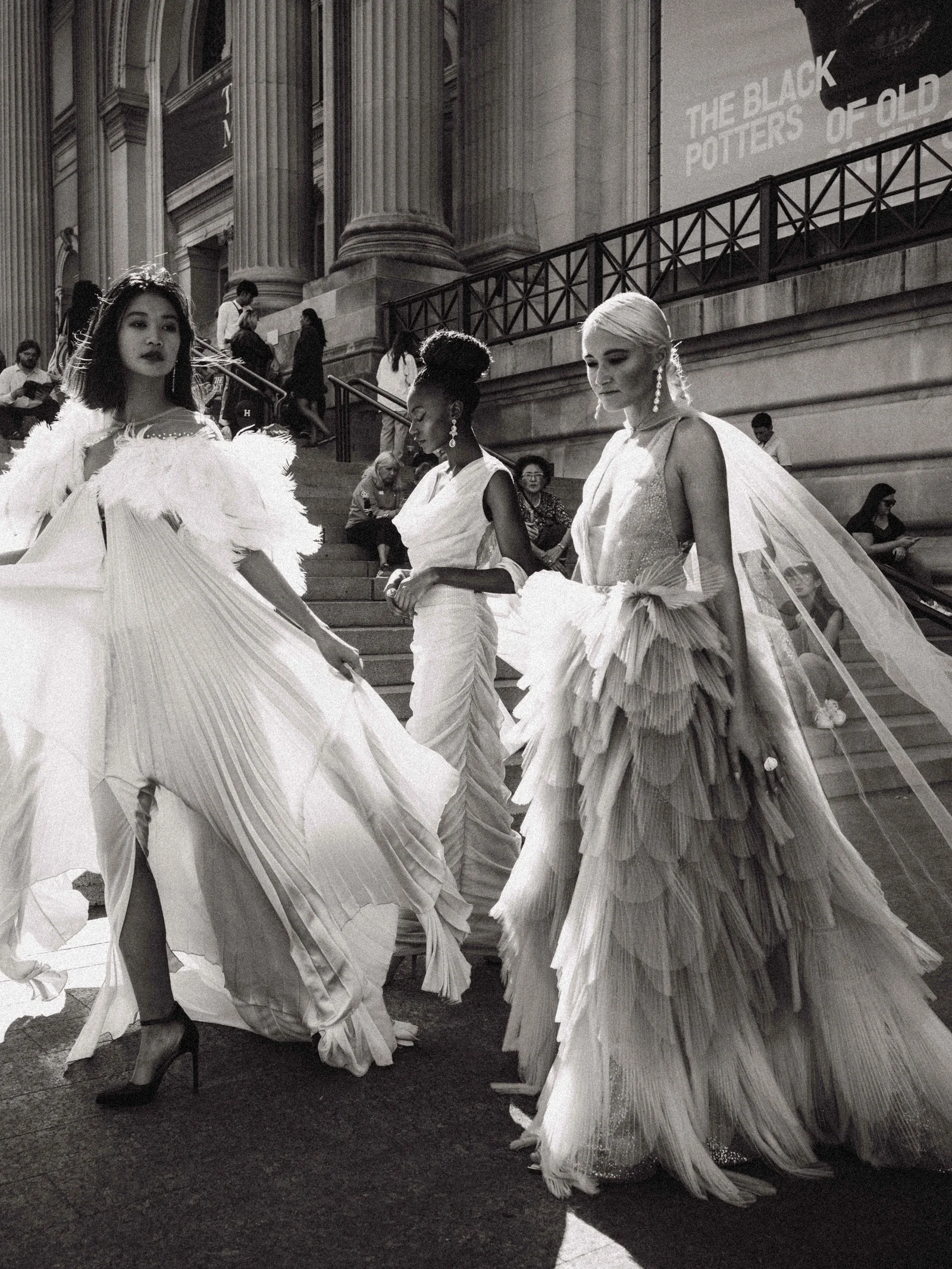 Alexis Monsanto — Black-and-white outdoor fashion portrait of three models