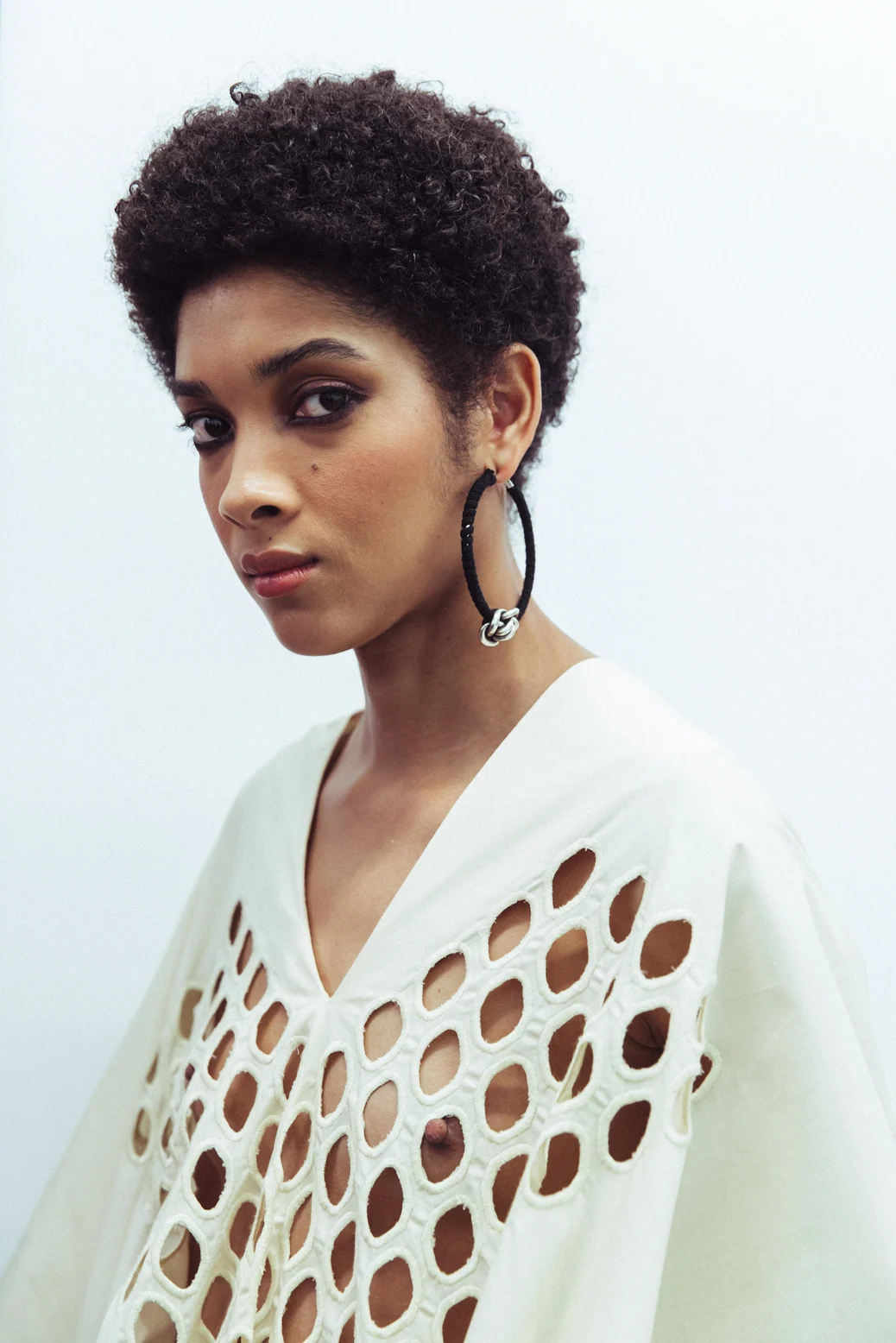 Diotima — Close-up portrait in an openwork knit
