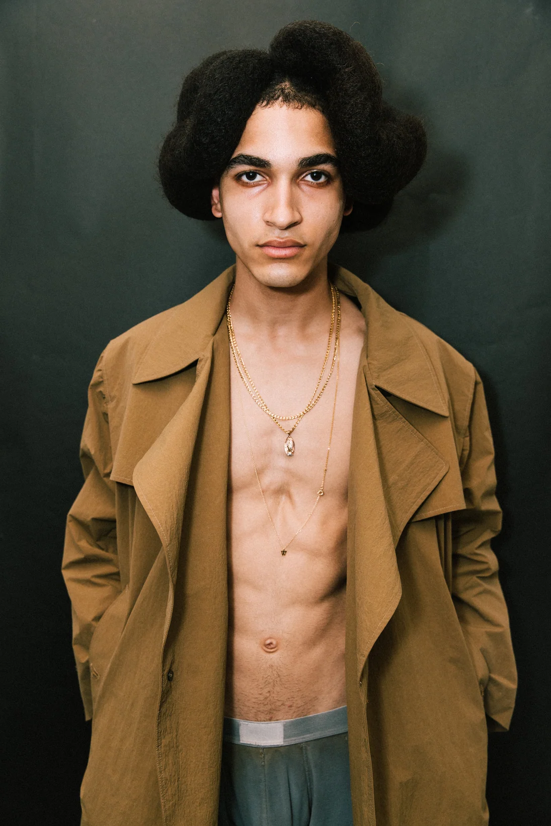 Willy Chavarria — A model in a sharply tailored open jacket