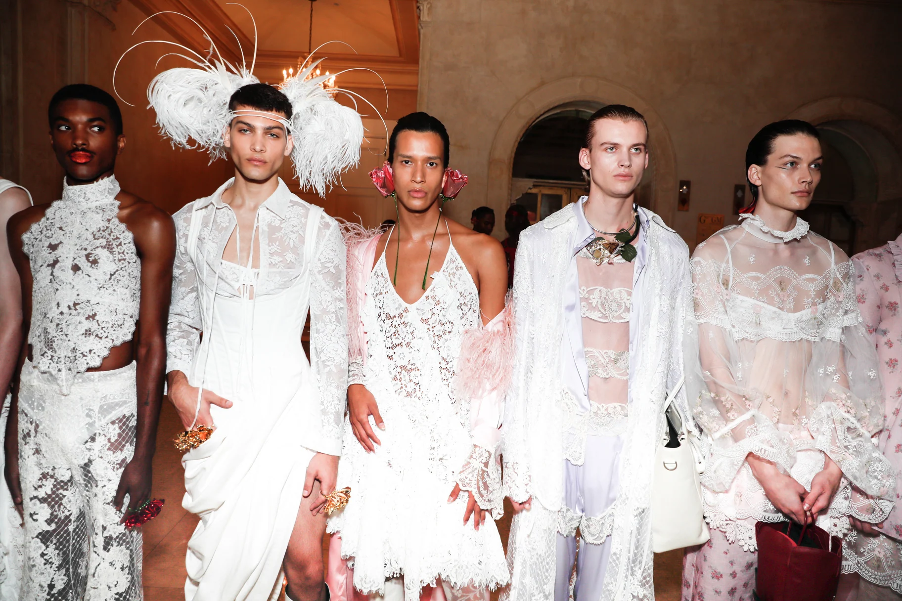 Palomo Spain — Models gathered backstage in detailed eveningwear