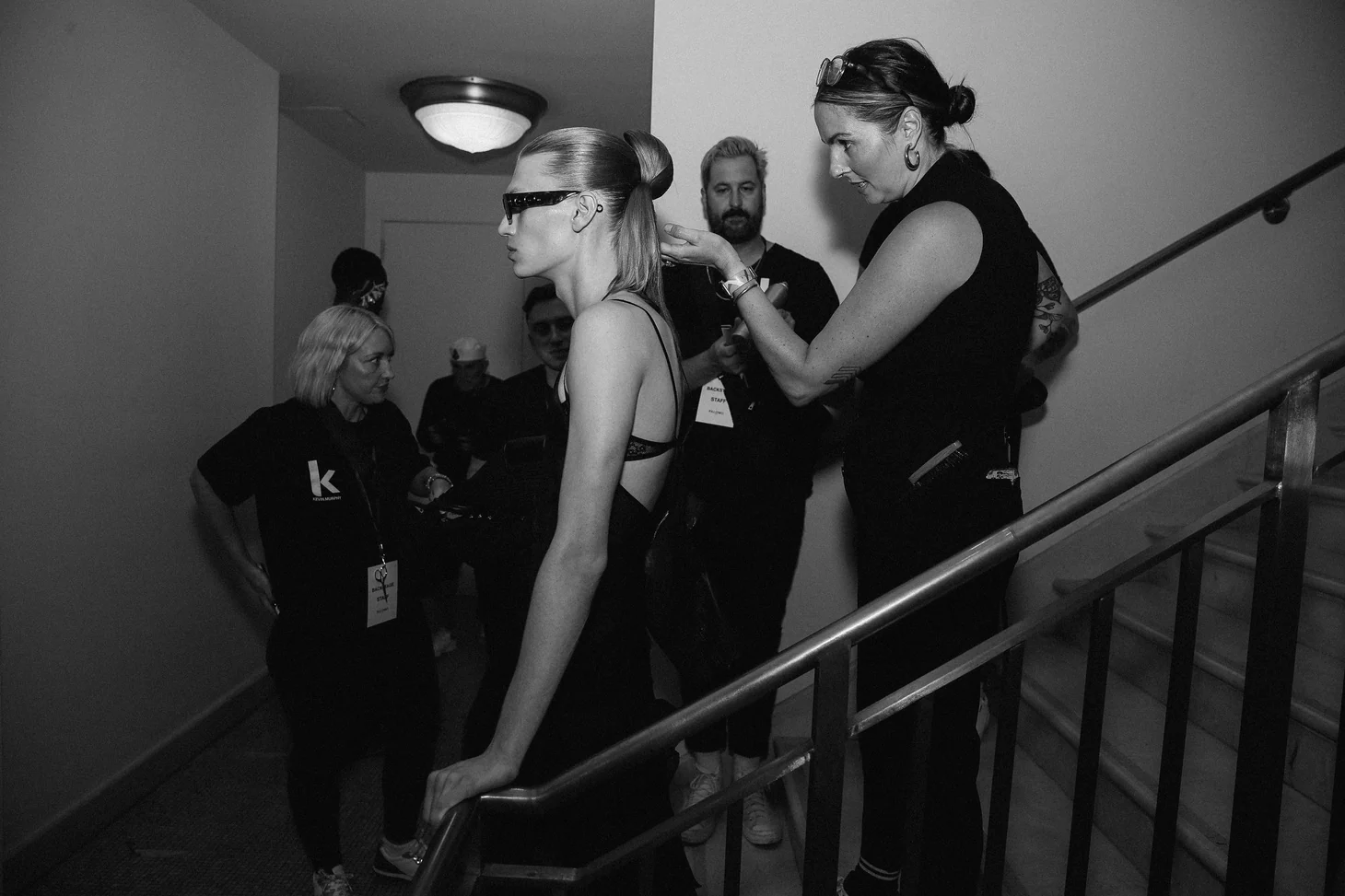 Palomo Spain — A candid scene on a backstage staircase