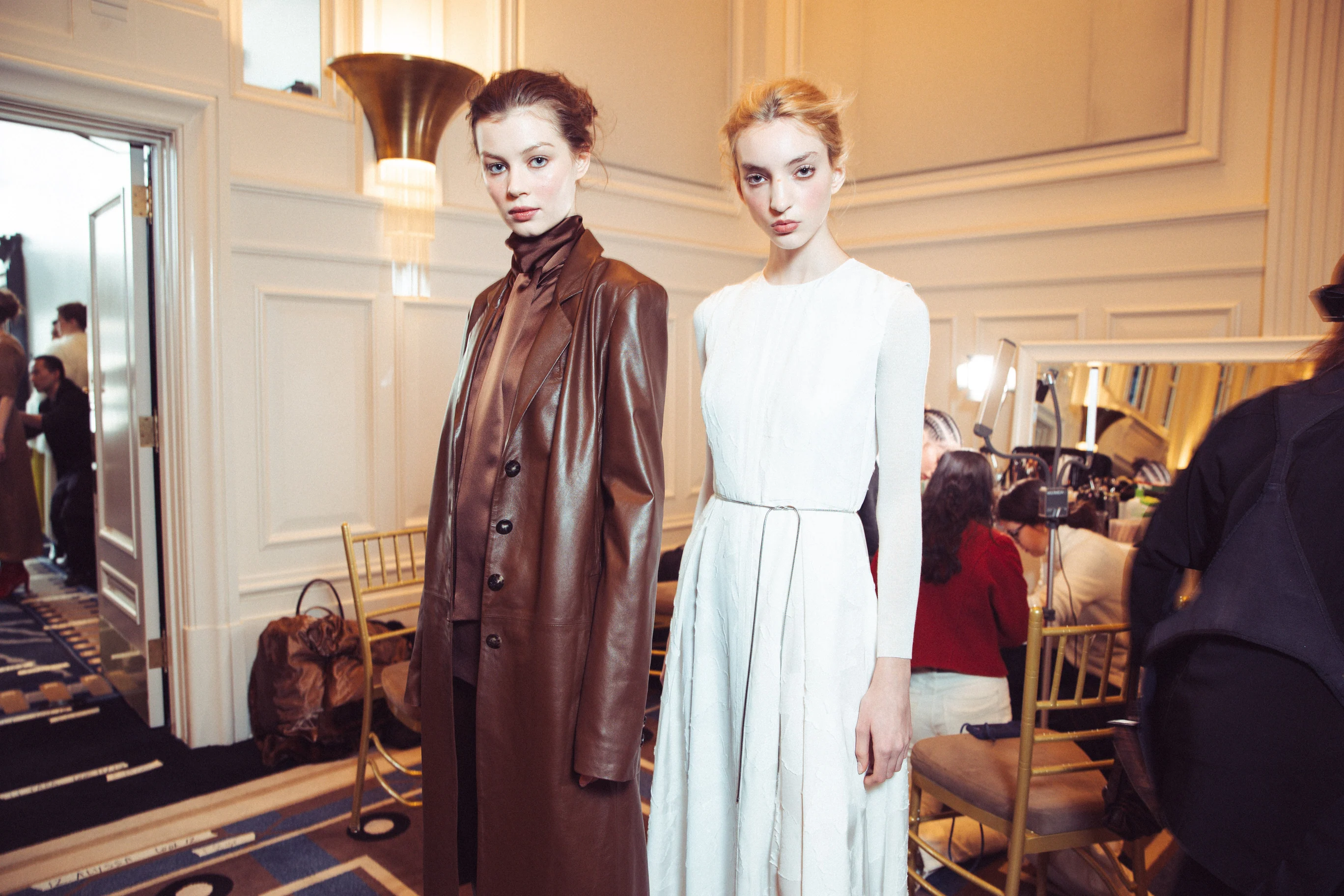 Alejandra Alonso Rojas — Two models in draped and tailored fashion looks